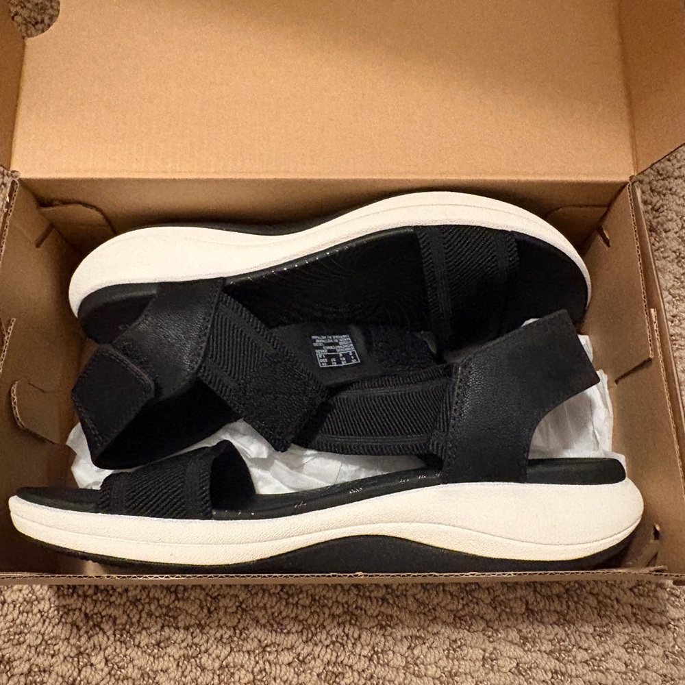 Clarks Black Sandals with White Sole